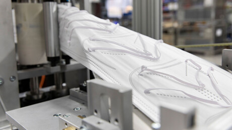 หน้ากากป้องกัน FFP2 ในการผลิตที่ Unimatic